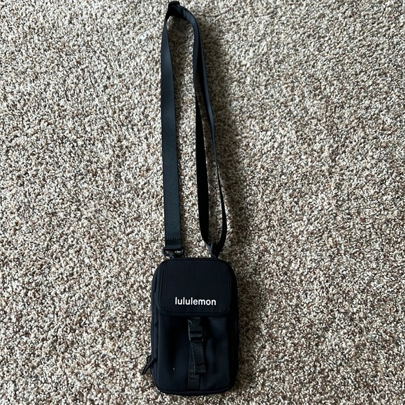 lululemon athletica Handbags - Lululemon Black Crossbody. Can be worn as crossbody or around waist.